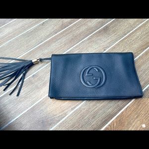 Gucci black leather clutch